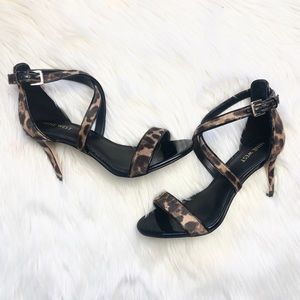 Nine West Leopard wrap around strapped heels.. Worn once
